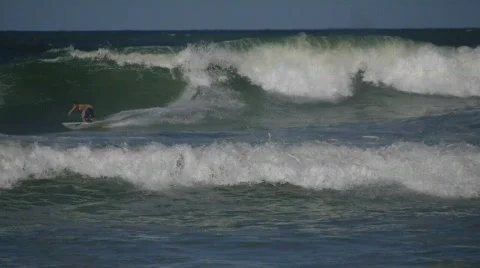 A surfer rides a wave Video stock 849426