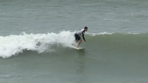 Surfer rides a wave. Stock Footage 26748930