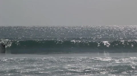 Surfer Rides on a Wave Stock Footage 67532540