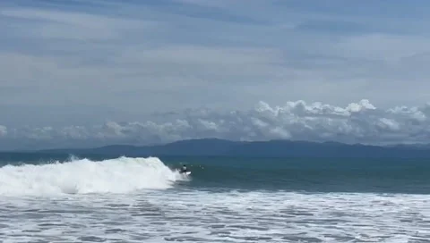 Surfer Rides Wave SD Stock Footage 175304395