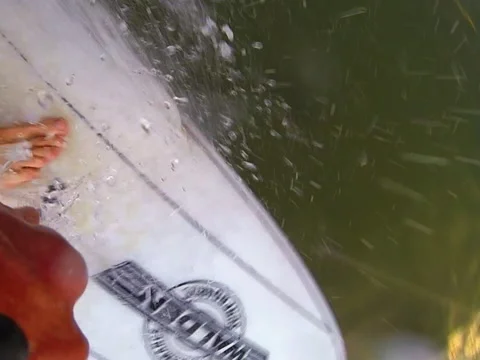 Surfer rides the waves Stock Footage 42544298