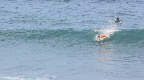 Surfer riding at the ocean big wave Stock Footage 8949409