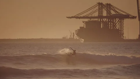 Surfer riding the perceft ocean wave at golden sunset. Stock Footage 285723325