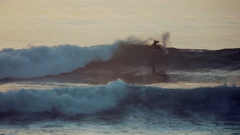 Surfer riding the perfect blue ocean wave. Stock Footage 285724250