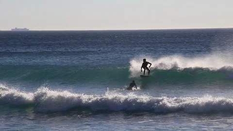 Surfer riding wave 1 Stock Footage 86611144