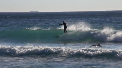 Surfer riding wave 2 Stock Footage 86611339