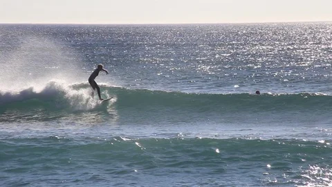 Surfer riding wave 3 Stock Footage 86610765