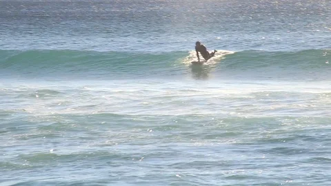 Surfer riding wave 5 Stock Footage 86610950