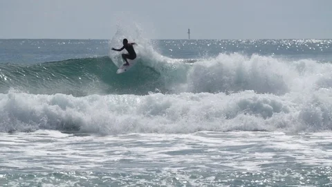 Surfer riding a wave bails from board Video stock 93722796