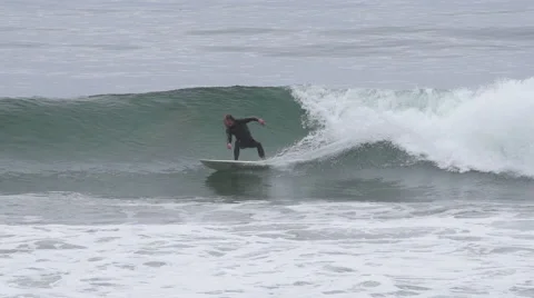 Surfer Riding a Wave in Slow Motion 動画素材 43145091