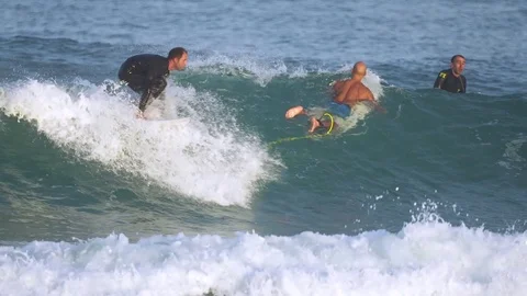 Surfer Riding waves Stock Footage 71071314