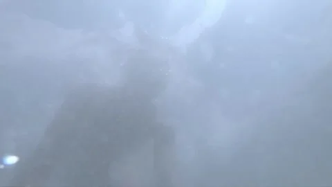 Surfer Riding the Waves of the Ocean Stock Footage 293888938