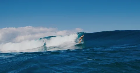 Surfer ripping on big wave Stock Footage 105754707