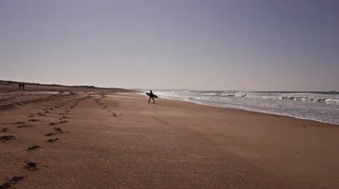 Surfer running on the beach paradise Stock Footage 35953485