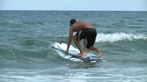 Surfer in sea Stock Footage 12061444