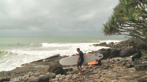 Surfer sits Stock Footage 5500513