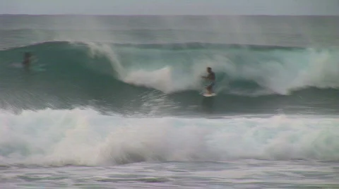 Surfer sprays a wave HQ Stock Footage 240963