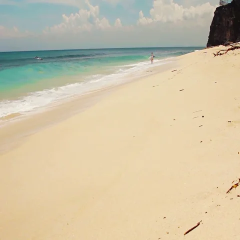 Surfer standing by the sea 스톡 동영상 69701032