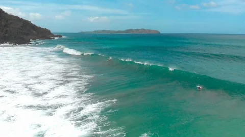 Surfer standing then falling Stock Footage 105734600
