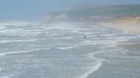 Surfer starting at the beach Stock Footage 107319214