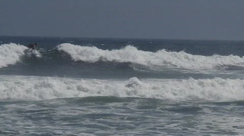 Surfer in Storm Waves Stock Footage 719429
