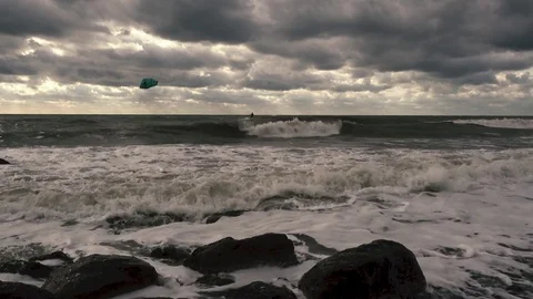 Surfer on the stormy sea Stock Footage 81402986