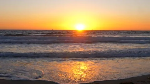 Surfer with surf board running on the beach, California sunset Stock Footage 82947203
