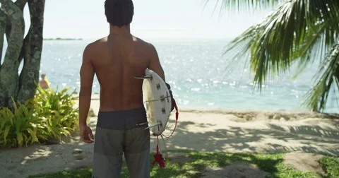 Surfer With Surfboard On Shore Video stock 83050894