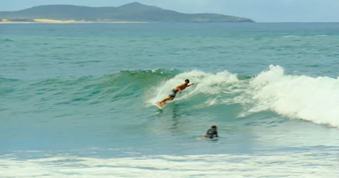Surfer Surfing in Australia Stock Footage 51981848