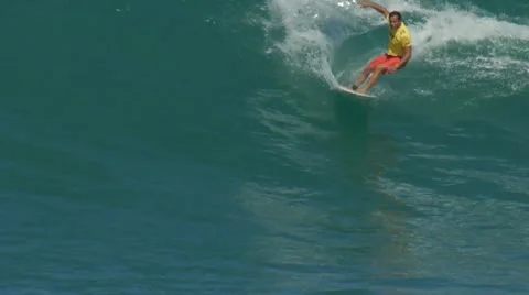 Surfer surfing in big wave north shore Hawaii 60fps Stock Footage