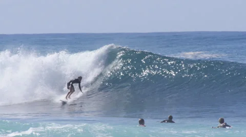 Surfer surfing in big wave north shore Hawaii banzai pipeline 1080 60P Stock Footage