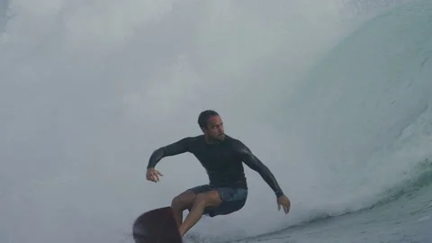 Surfer surfing on ocean waves Video stock 164420677