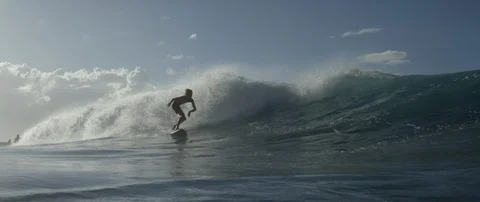 Surfer surfing over the big wave in sea Stock Footage 108642171