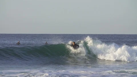 Surfer surfing over ocean waves Stock Footage 85815084
