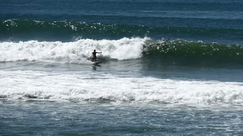 Surfer taking a dive Stock Footage 126669617