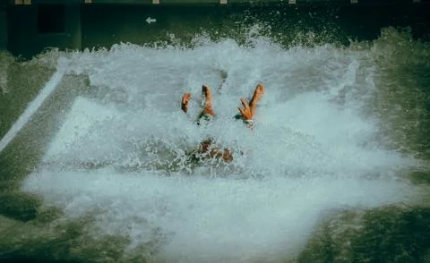Surfer taking a Dive Foto stock