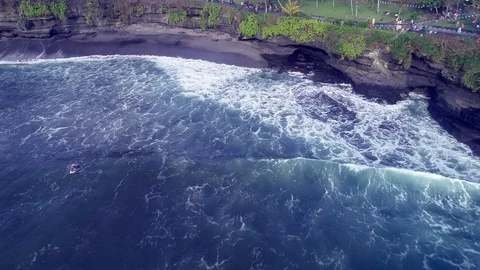 Surfer at the top of the wave in the ocean, top view Stock Footage 102986450
