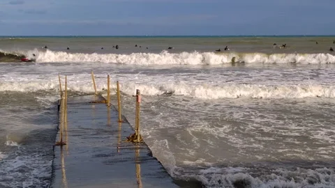 Surfer training in the Ligurian coast Stock Footage 140731064