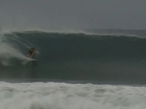 SURFER ON TUBERIDE ESCONDIDO MEXICO 2 Stock Footage 76584697