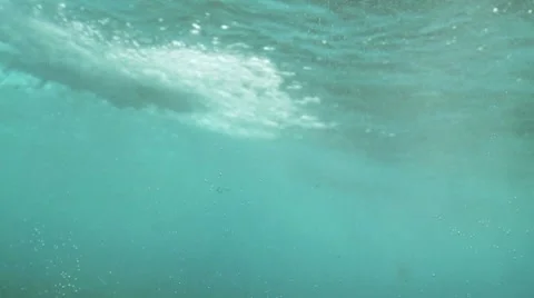 Surfer turns underwater Stock Footage 8989641