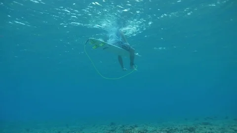 Surfer From Underneath Water 2 Stock Footage 79733926
