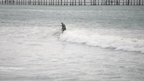 Surfer in Ventura, CA Stock Footage 144795300