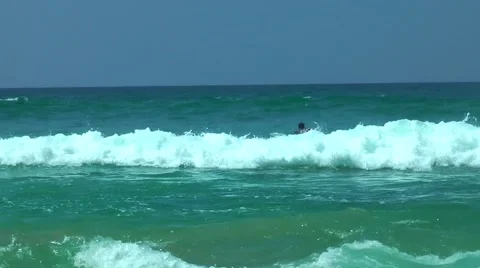 Surfer Waiting for the Big Waves 스톡 동영상 61753737