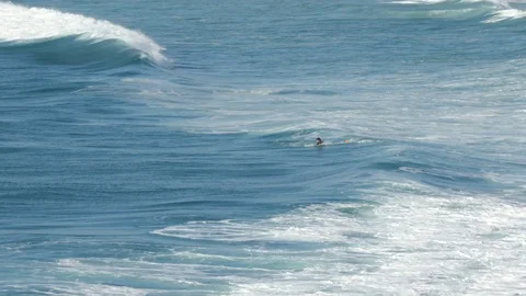 Surfer waiting for wave Stockbeeldmateriaal 104405530