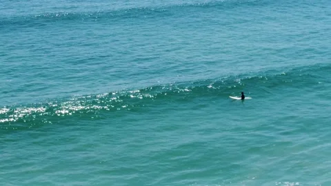 Surfer waiting for a wave Stock Footage 161379539