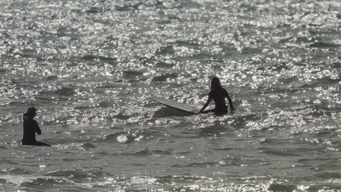 Surfer waiting for waves in the lineup Stock Footage 88282935