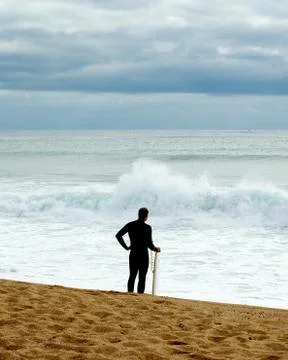Surfer Waiting for Waves Stock Photos