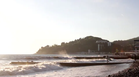 Surfer Walking on the Pier, Surfer Walking Along the Quay Stock Footage 63602647