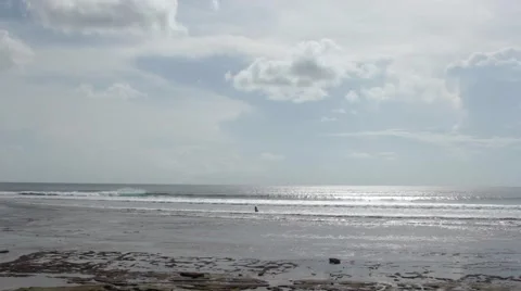 Surfer Walking on the Reefs at Low Tide Stock Footage 67532810