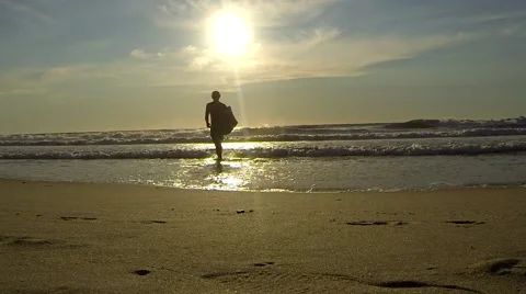 Surfer Walking Through Water Stock Footage 58206710